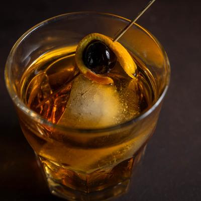 A close up of Old Fashioned drink, top view.