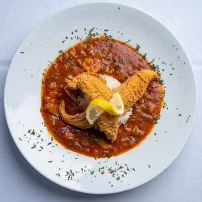 Roz's Shrimp Creole served with Fried Catfish Strips.