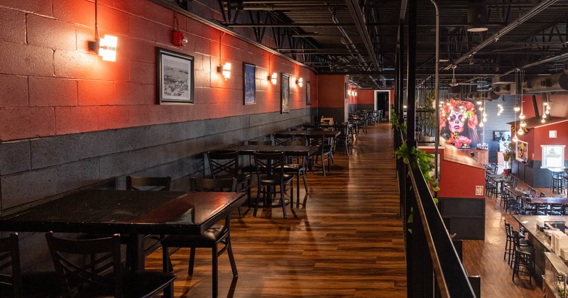 Interior, upper floor with tables and chairs