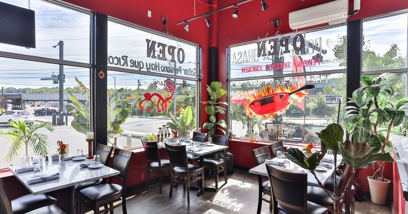 Nicely done interior dining area with set tables ready for guests