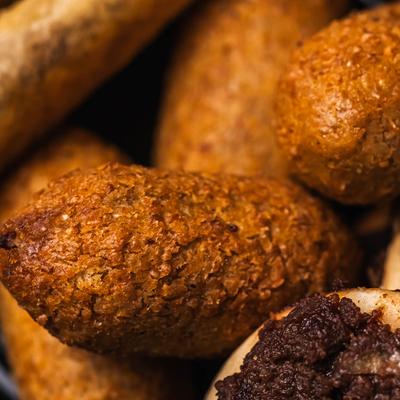 Close-up of fried kibbeh croquettes.