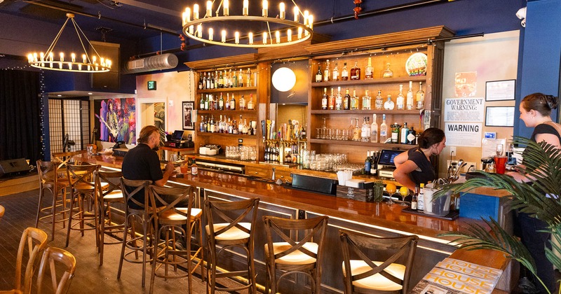 Interior, bar counter with guests