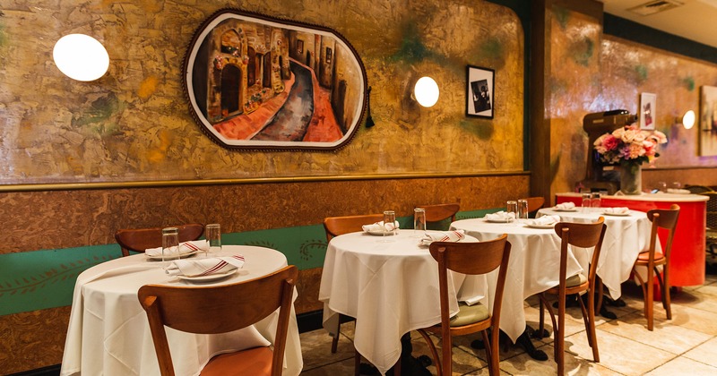 Interior, dining area, tables with tableware and glasses
