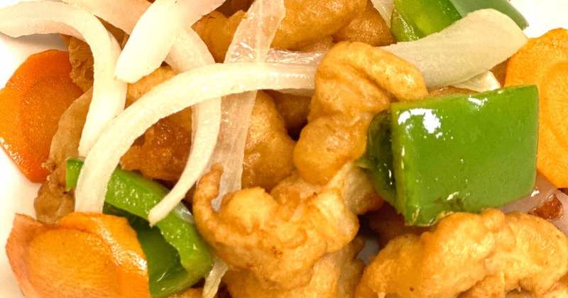 Sweet and Sour chicken with green pepper, onion, and carrot