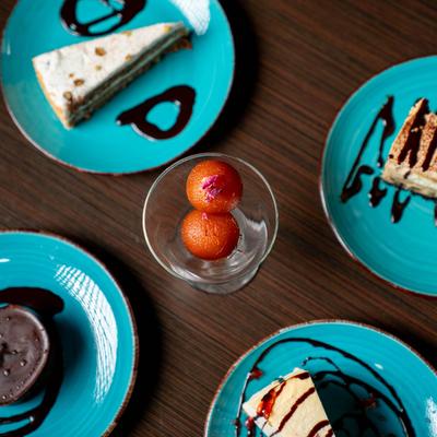 Top view of assorted desserts on a table.