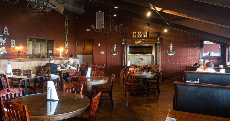 Restaurant interior, guests dining