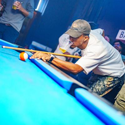 People playing pool.