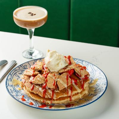 Strawberry shortcake pancakes accompanied by an espresso martini.