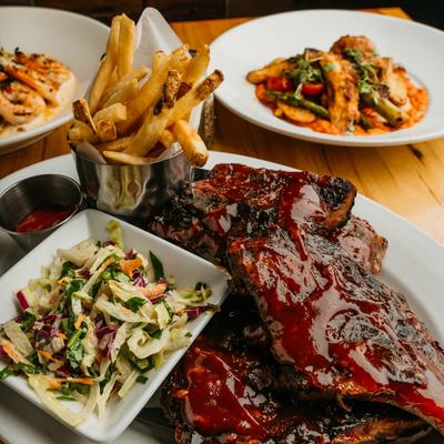 BBQ Baby Back Ribs, served with Asian slaw, and fries.