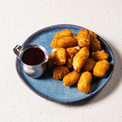 Cheese curds served with syrup.