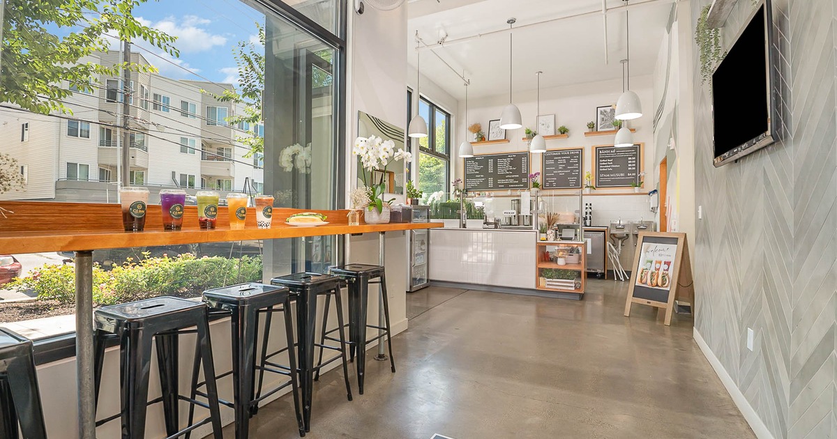 Counter height table and stools by the window