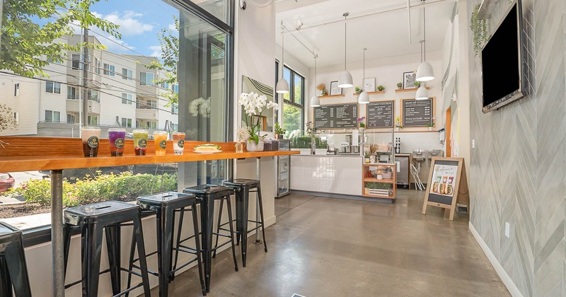 Counter height table and stools by the window