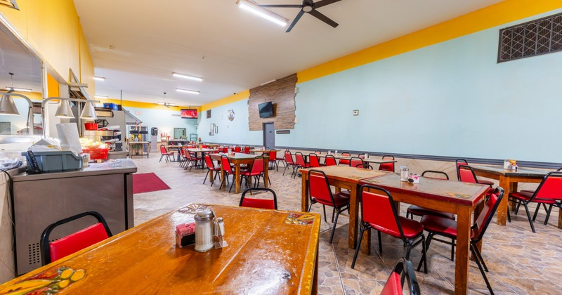 Interior, dining area with tables and chairs