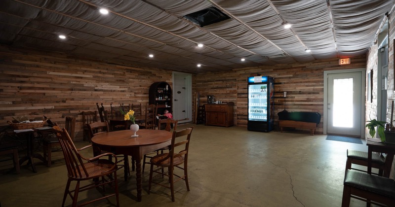 Dining area, round table and wooden chairs