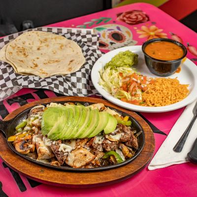 Fajita Locas served with sides.