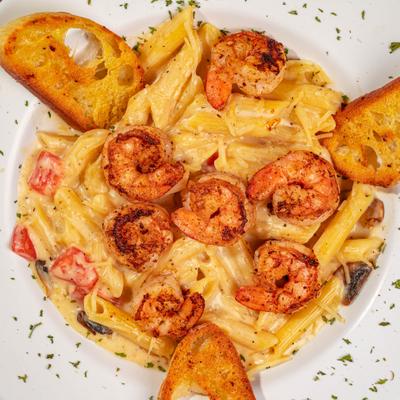 Alfredo pasta with shrimp, top view.