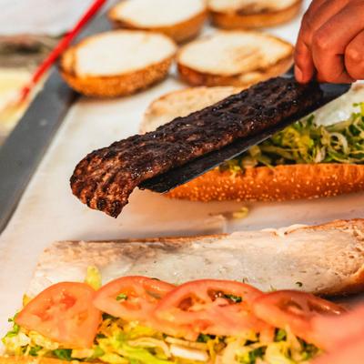 Hands preparing food.
