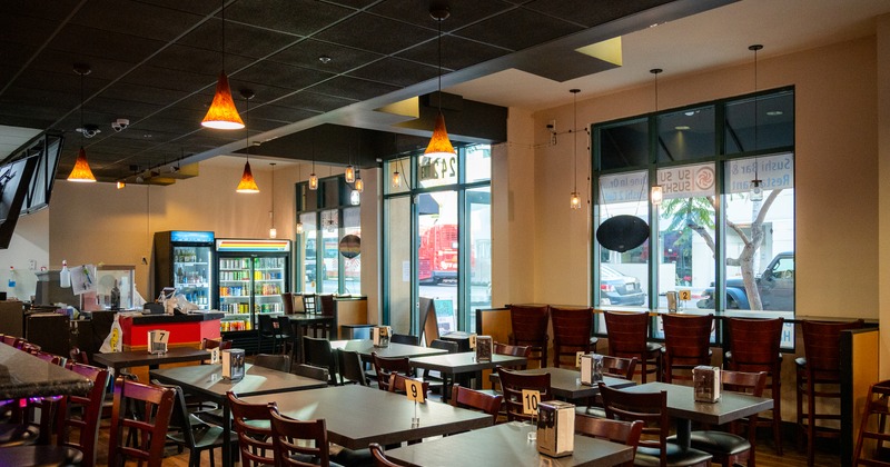 Dining room, tables, chairs, view through the shop window