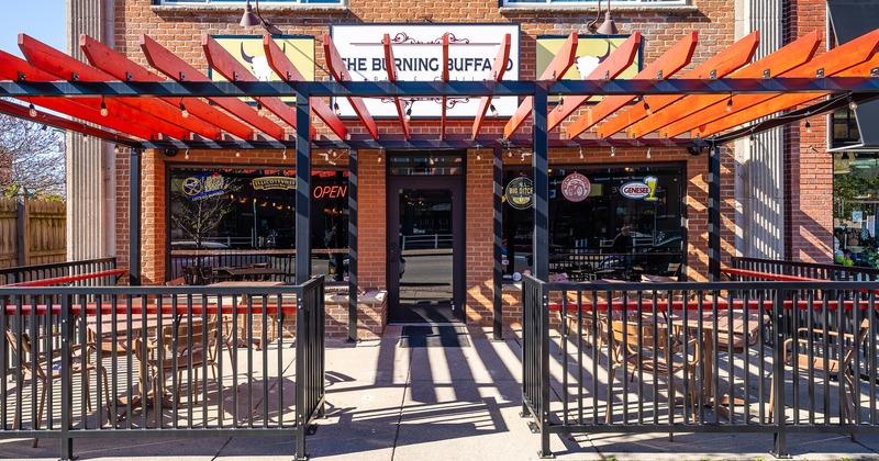 Outdoor seating area in front of entrance