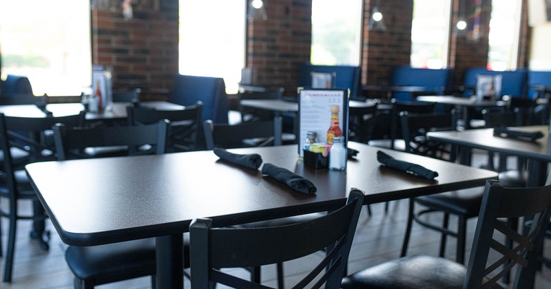 Interior, tables ready for guests