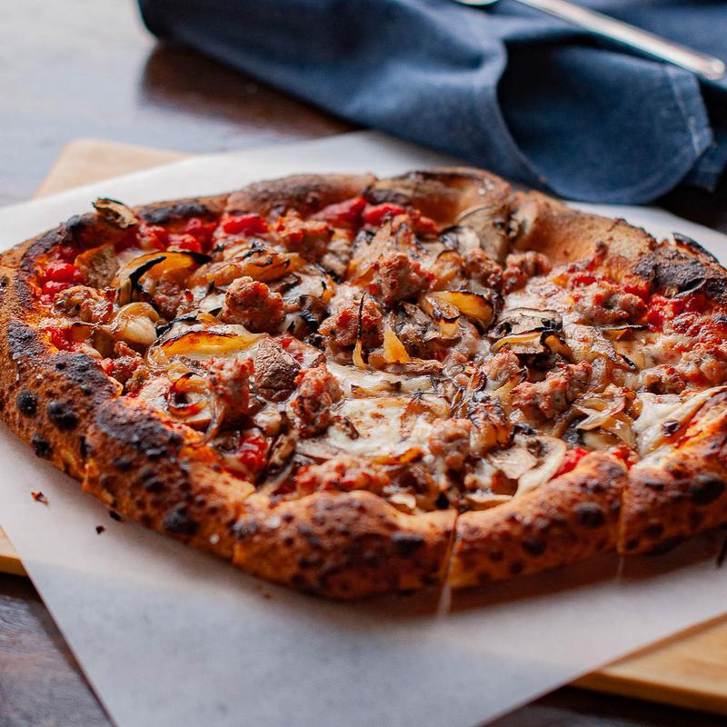 Italian sausage, caramelized onions, mushrooms, fresh mozzarella, tomato sauce - can be GF photo