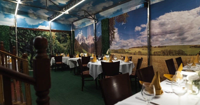 Interior, seating area with tables and chairs
