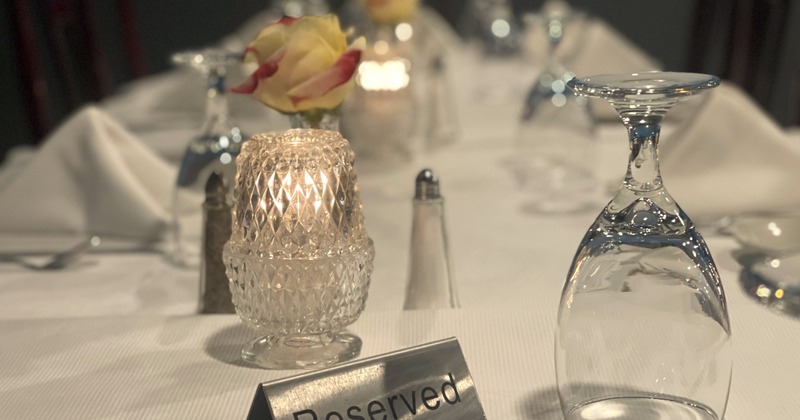 Interior, a set table waiting for guests