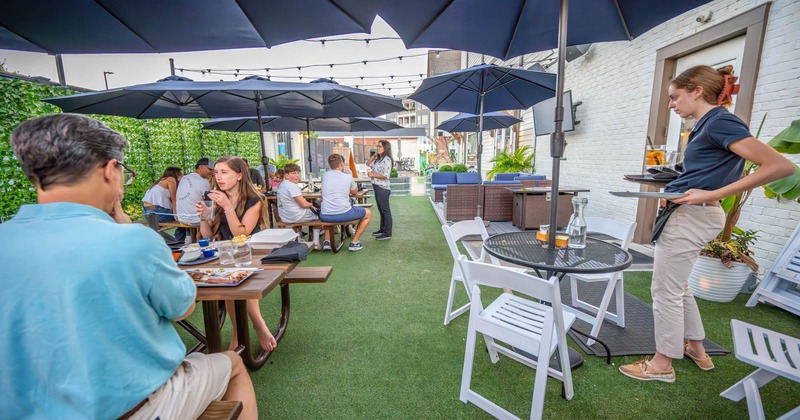 Tables and chairs, guests at the restaurant