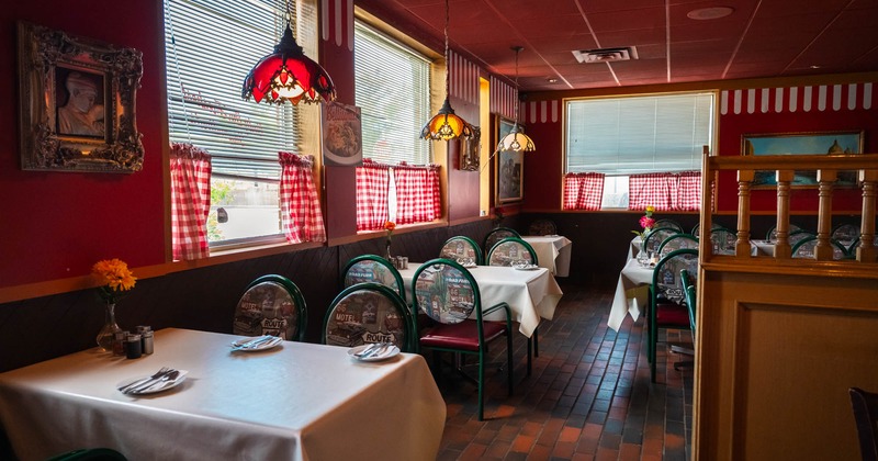 Interior, dining area with tables and chairs
