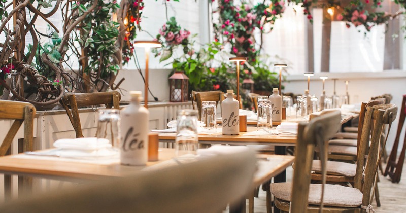 Interior, dining area with fully set tables