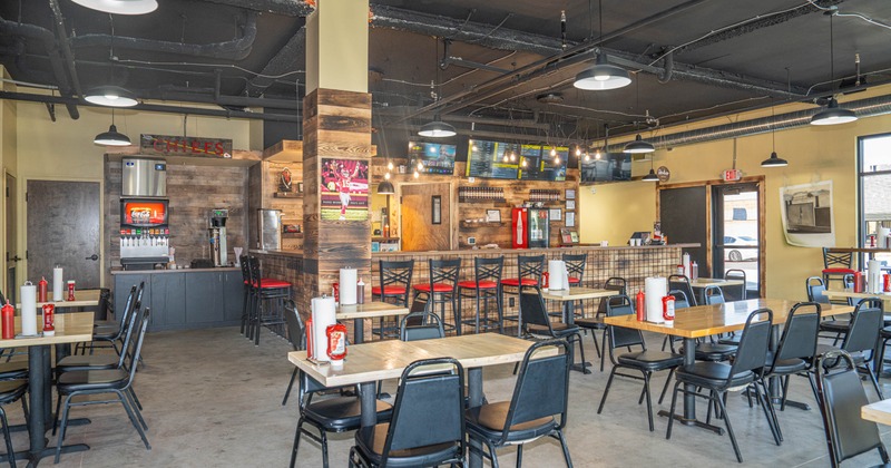 Interior, seating area with tables and chairs