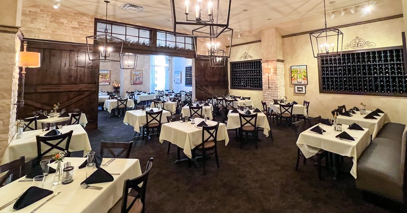 Bright interior, dining tables ready for guests