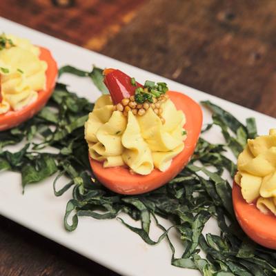 Beet pickled deviled eggs, closeup