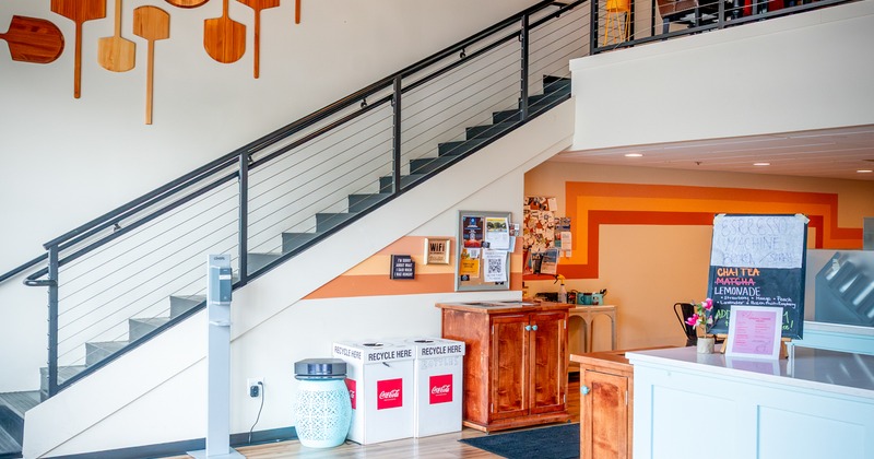 Interior, food counter, stairs to the gallery