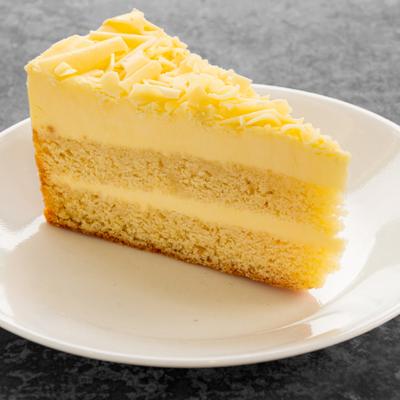 Slice of layered Vanilla cake.