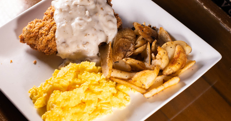 Grilled meat with dip, fries on the side