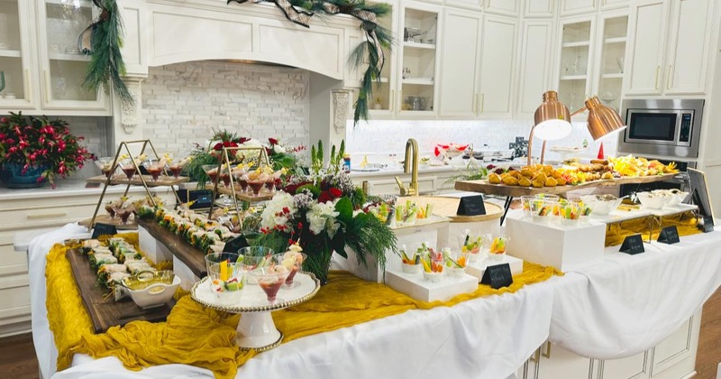 Tables filled with served food for an event