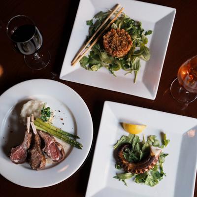 Tuna tartare, lamb chops, and grilled octopus.