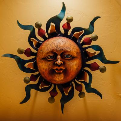 Sun face mural art