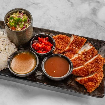 Chicken Katsu, with pickled veggies and sauce.
