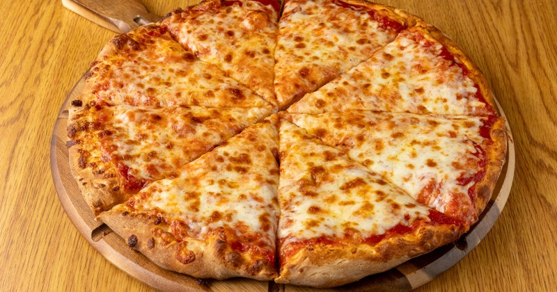 Whole Cheese Pizza served on wooden tray with a handle