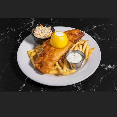 Fish and chips accompanied with coleslaw, tartar sauce, and lemon.