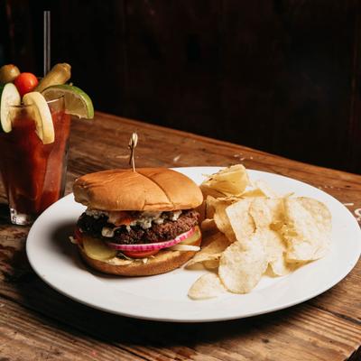 Burger served with chips