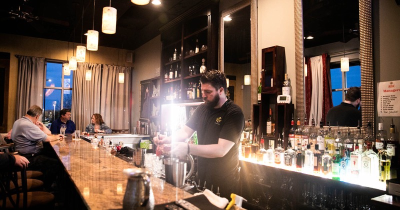 Bar with staff in action