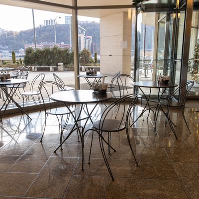 Interior, tables ready for guests