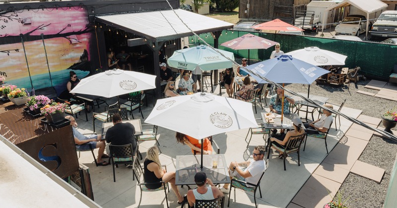 Exterior, patio, parasols, tables and chairs