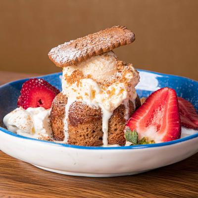 Churro cake with ice cream.