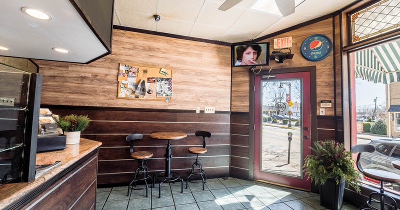 Interior, table and chairs near entrance