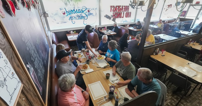 Interior, diner table, view above, guests