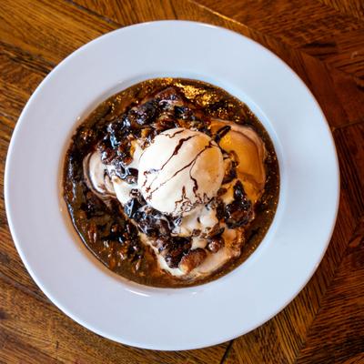 Bulldog Bread & Butter Pudding served with ice cream.